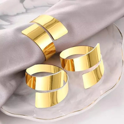 Set of 6 Golden Spiral Metal Napkin Rings by Monzzi