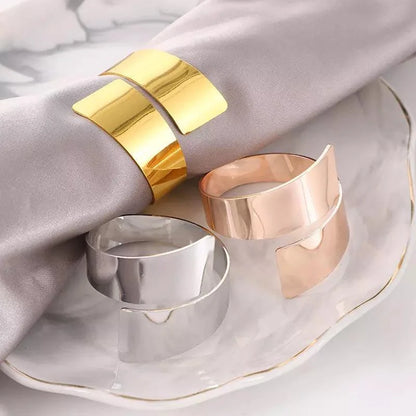 Set of 6 Golden Spiral Metal Napkin Rings by Monzzi