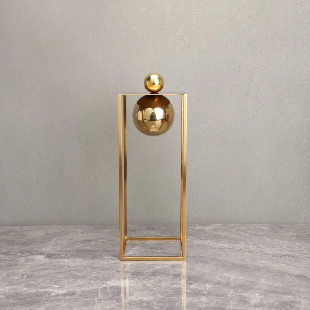 Geometric Abstract Sculpture Featuring Sphere and Gold Metal Frame