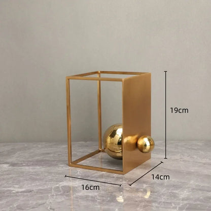 Geometric Abstract Sculpture Featuring Sphere and Gold Metal Frame