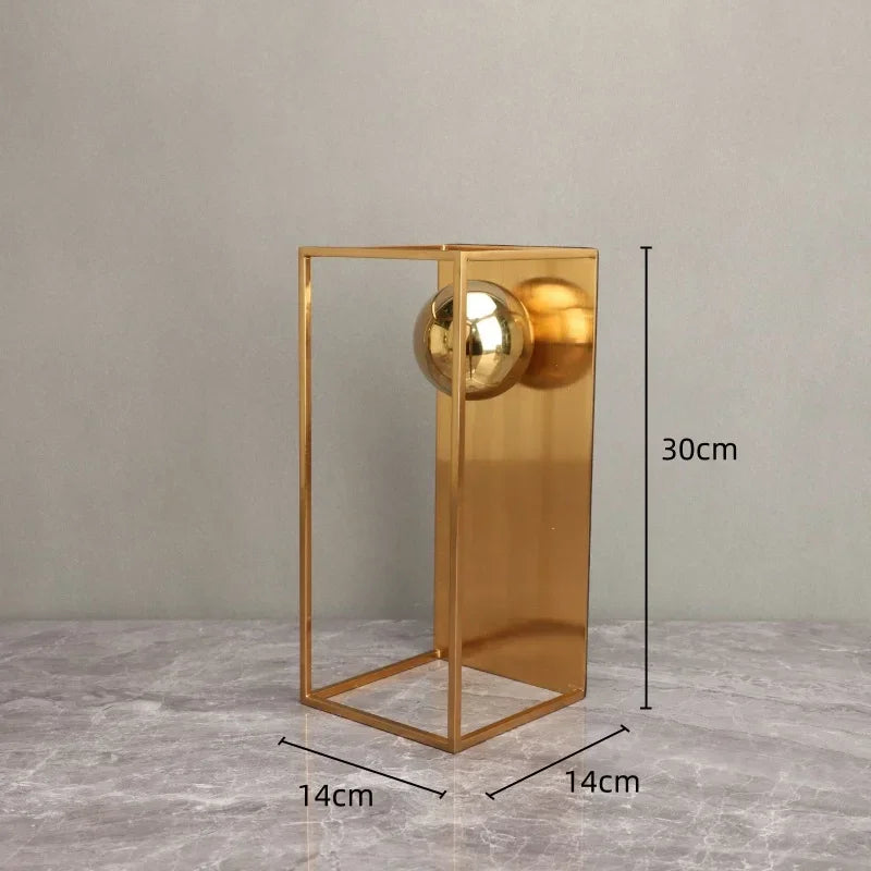 Geometric Abstract Sculpture Featuring Sphere and Gold Metal Frame