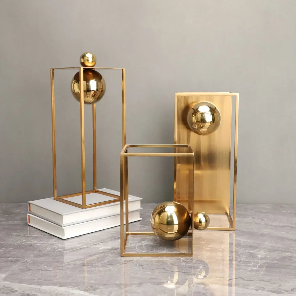 Geometric Abstract Sculpture Featuring Sphere and Gold Metal Frame