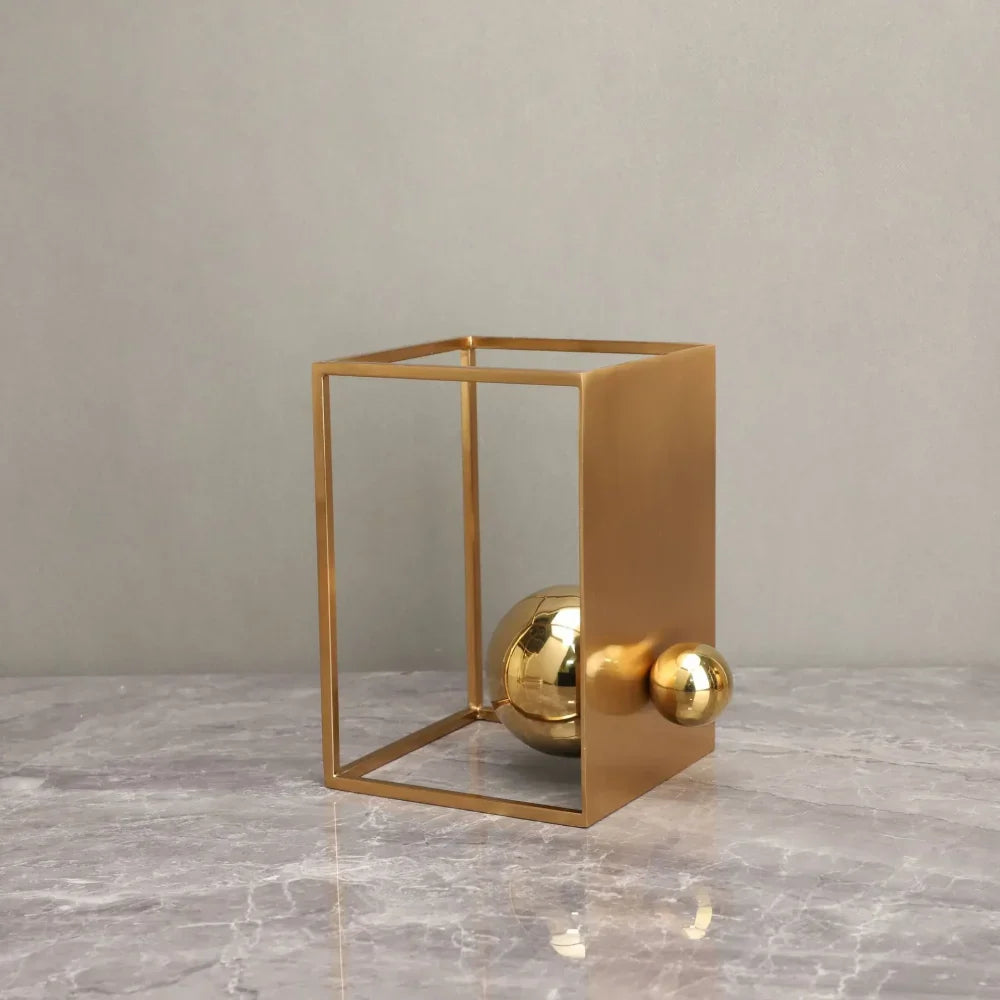 Geometric Abstract Sculpture Featuring Sphere and Gold Metal Frame