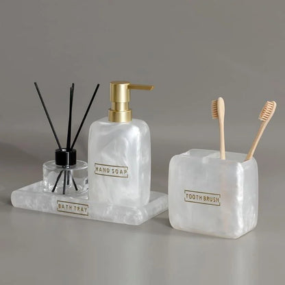 3-Piece Golden Resin Bathroom Set with Dispenser and Toothbrush Holder