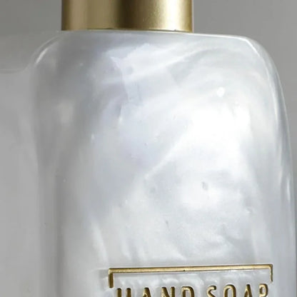 3-Piece Golden Resin Bathroom Set with Dispenser and Toothbrush Holder